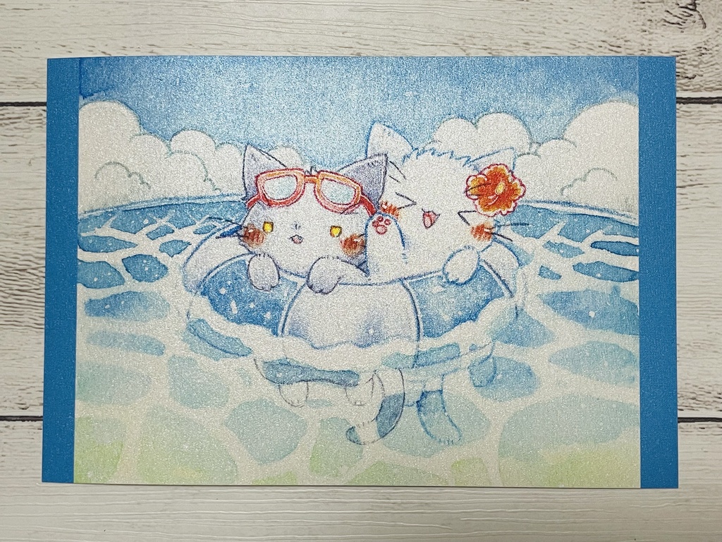 「猫さんと海」シリーズのポストカードです。