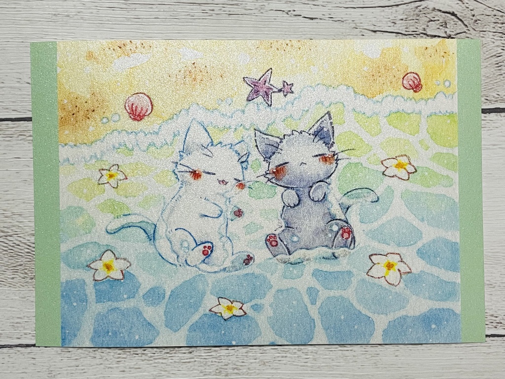 「猫さんと海」シリーズのポストカードです。