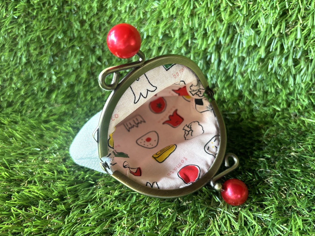 うめぼしおにぎりがま口ポーチ