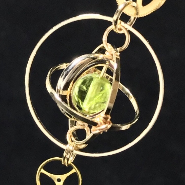 《クロノスの環》ペリドット・ゴールド