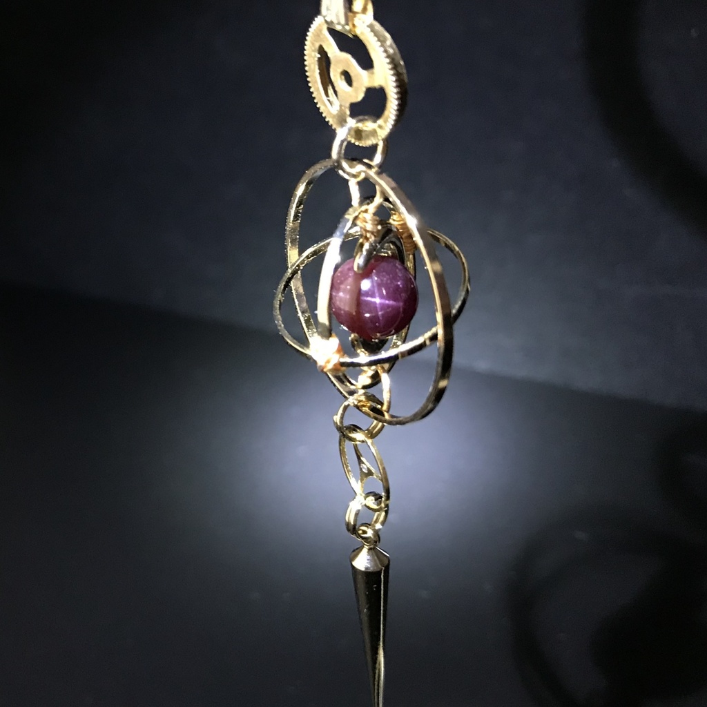 《クロノスの環》ガーネット・ゴールド