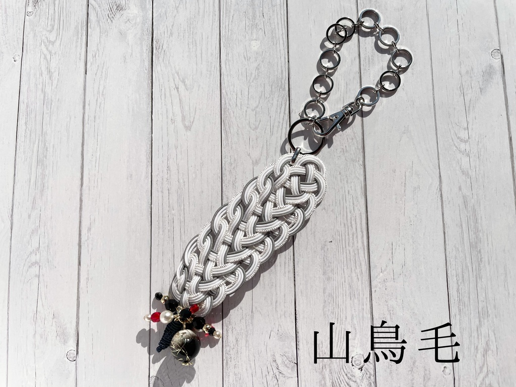 鳥太刀の約束の羽根バッグチャーム