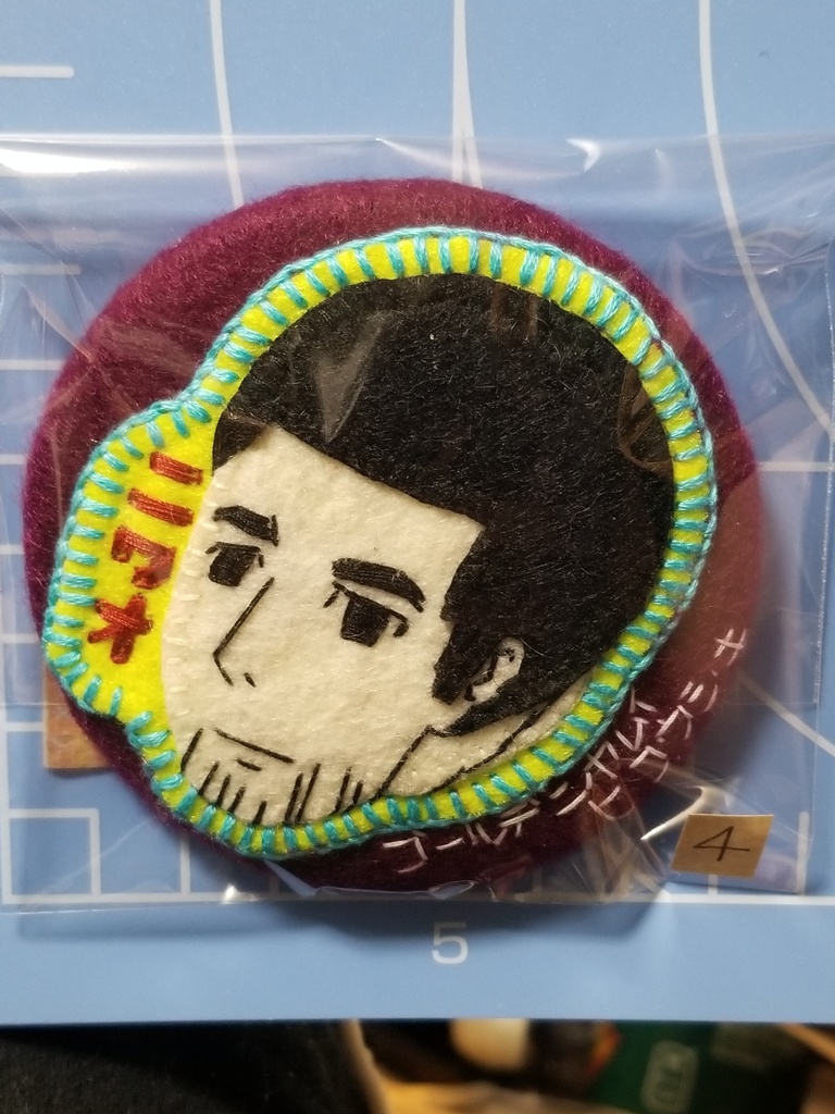 二話尾ブローチ