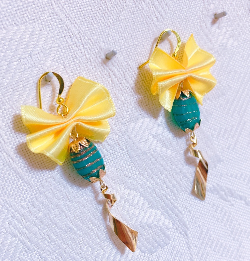 写真家 モチーフ 耳飾り