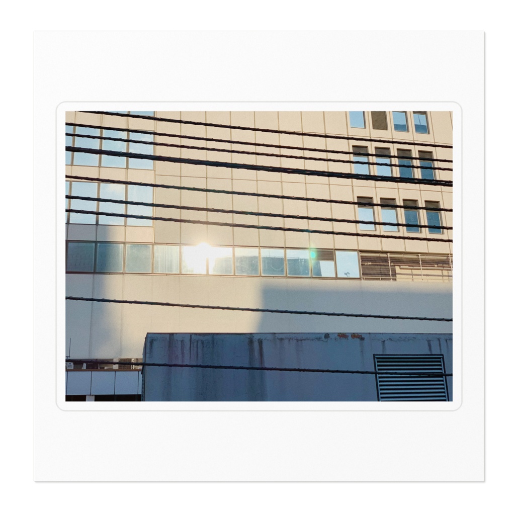 夕日に照らされるビルステッカー