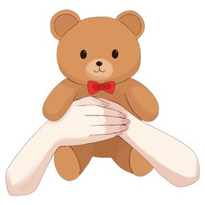 くまさんをぎゅっと抱っこしてる手
