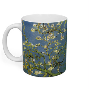 花咲くアーモンドの木の枝 マグカップ