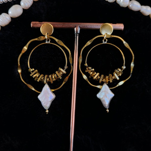 Pearl orbit earrings