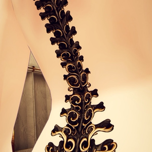 Engraving spine tattoo