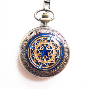 ☆星空と歯車と星の蓄光宇宙レジンオルゴナイトフローライト付き、懐中