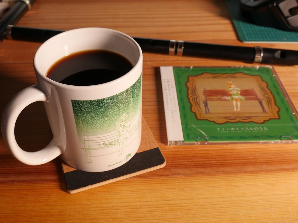 【ケルトアルバム付き】ねこと女の子、ティンホイッスル運指表付きマグカップ