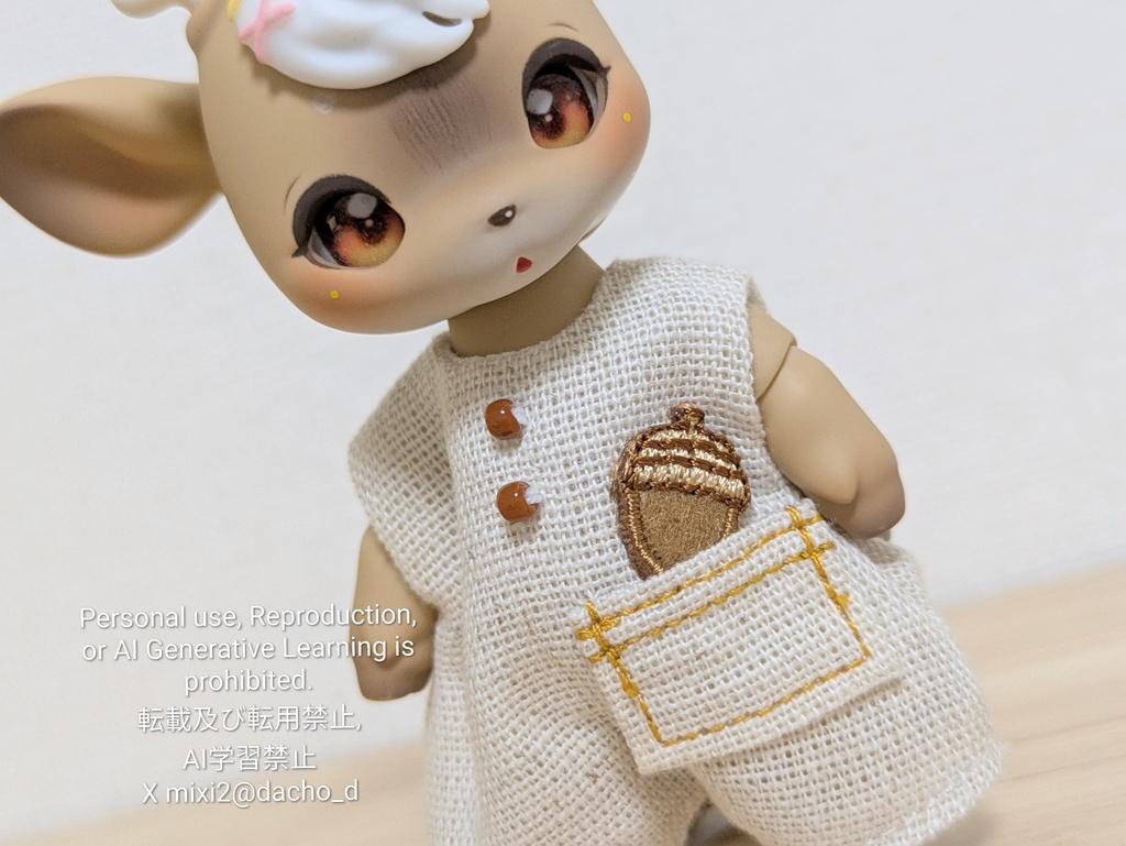 どんぐりひろいのロンパース