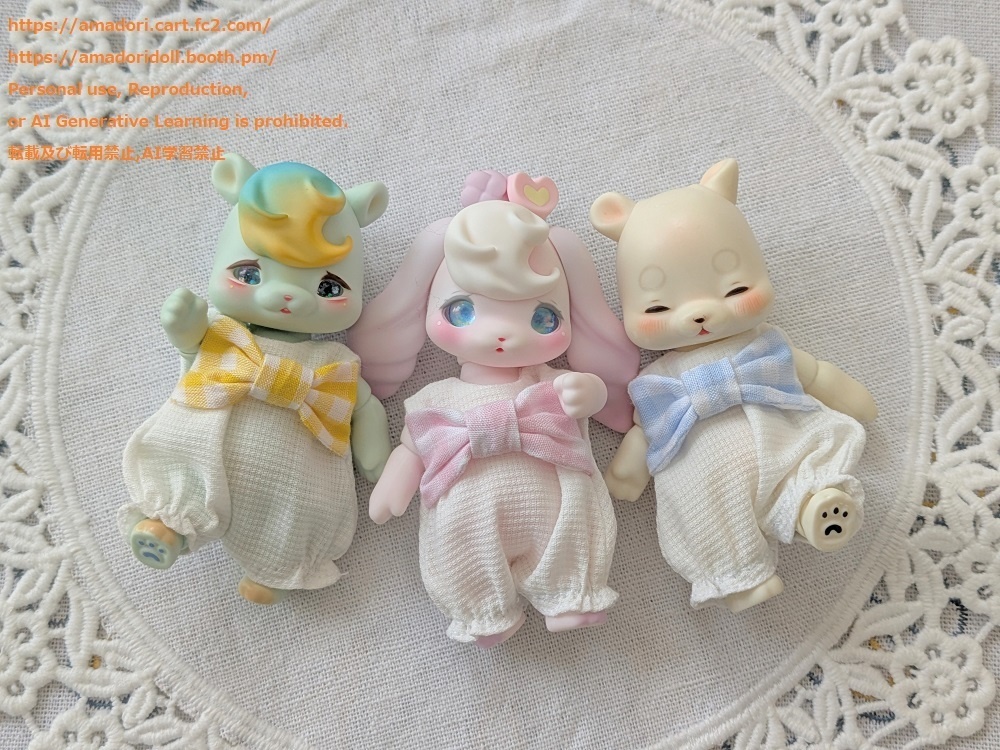 大きなリボンのロンパース