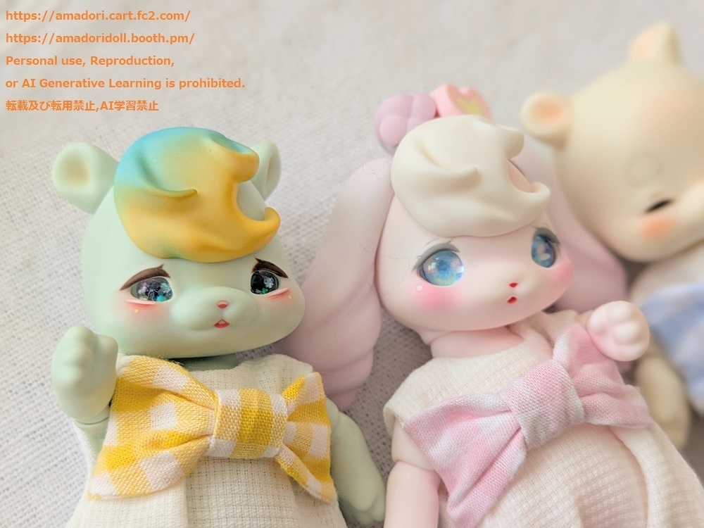 大きなリボンのロンパース