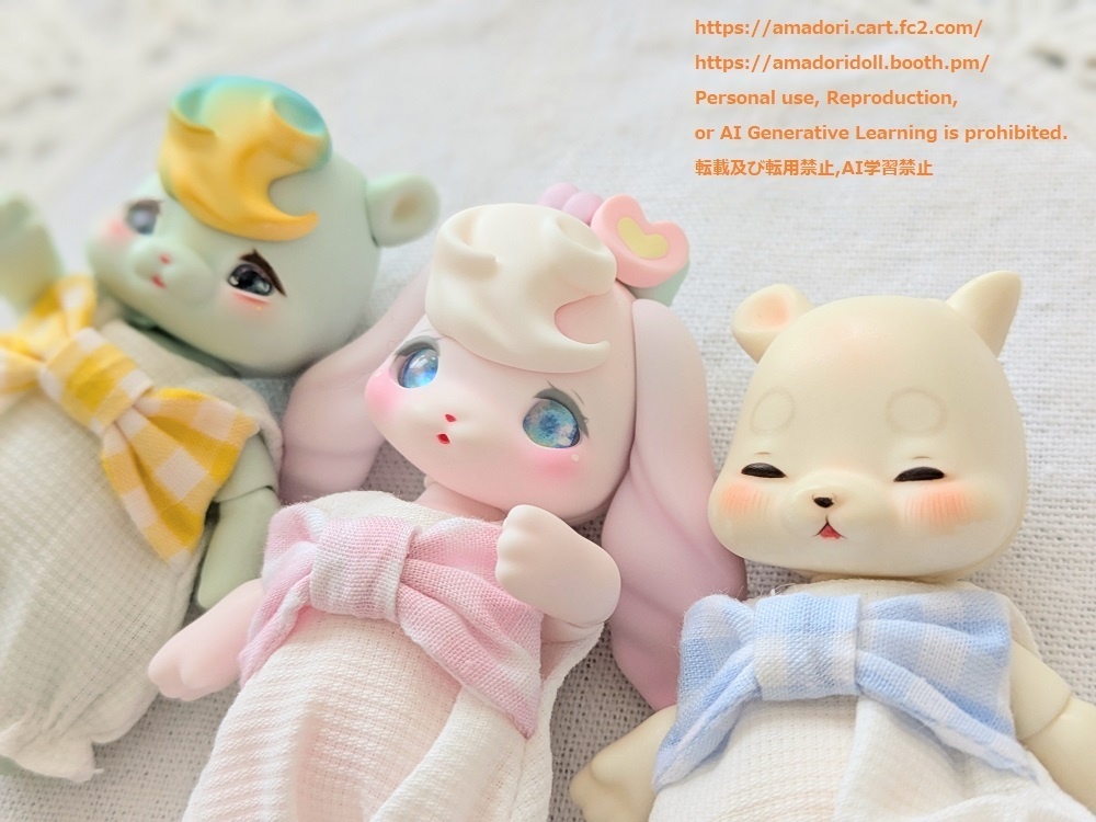 大きなリボンのロンパース