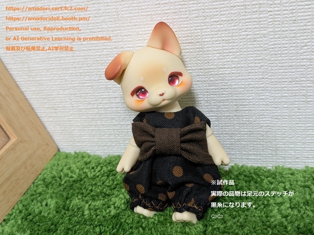 大きなリボンのロンパース