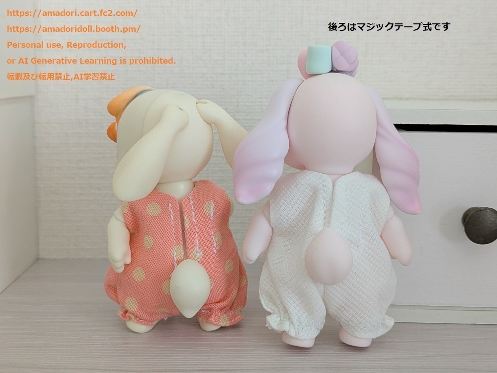 大きなリボンのロンパース