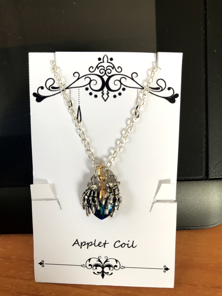 ダブルスカルハンドネックレス