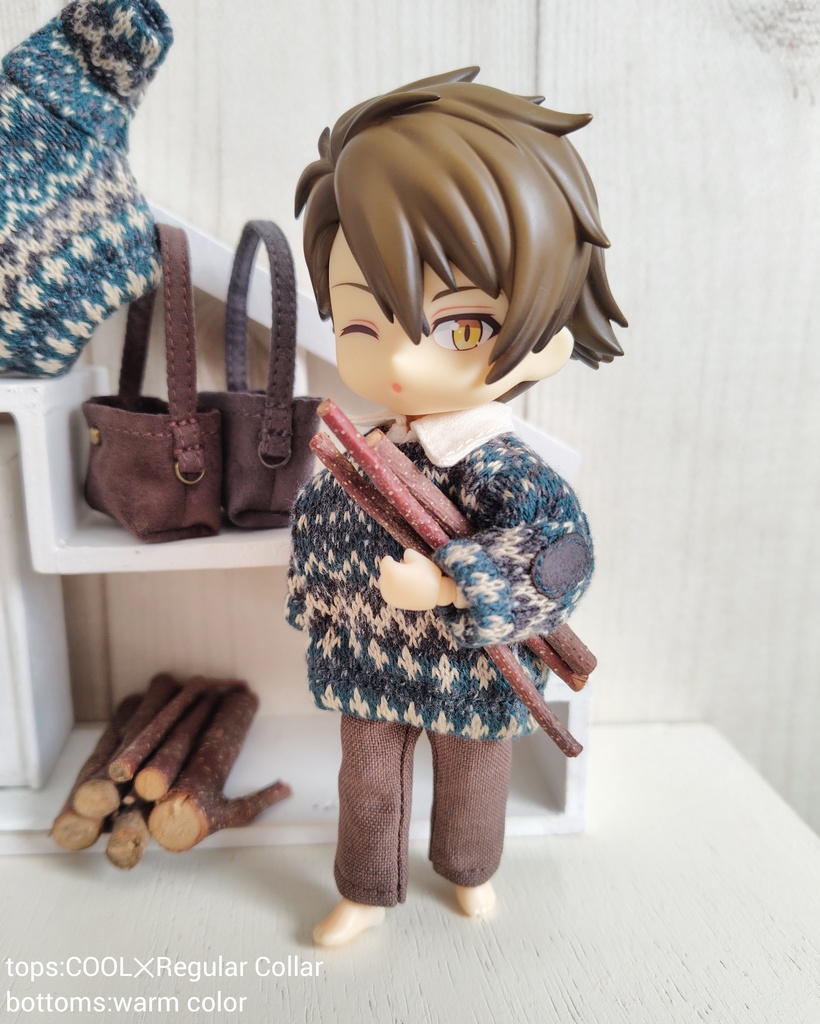 薪をくべる人の服