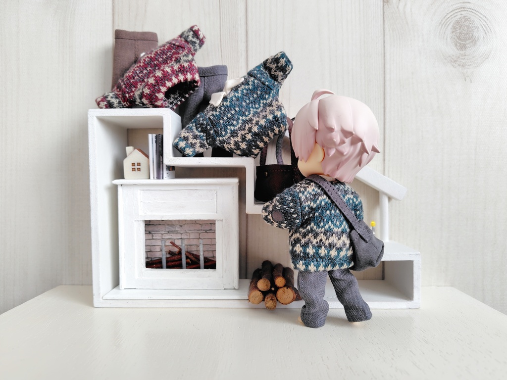 薪をくべる人の服