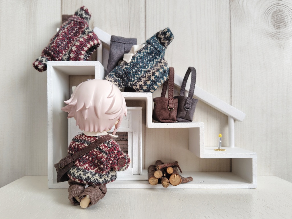 薪をくべる人の服