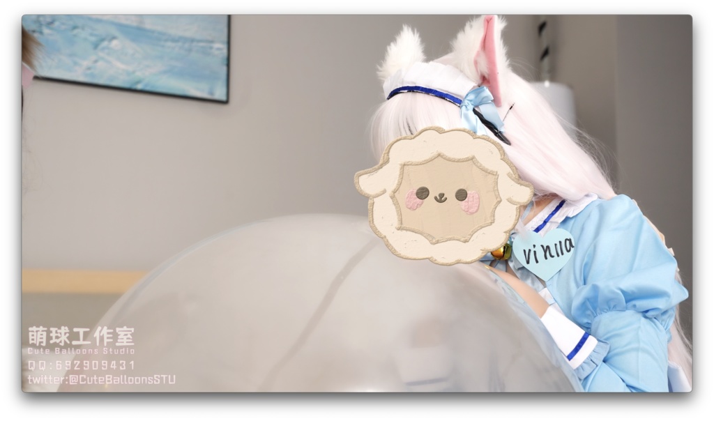 猫娘ペアがT 36風船を口で吹く