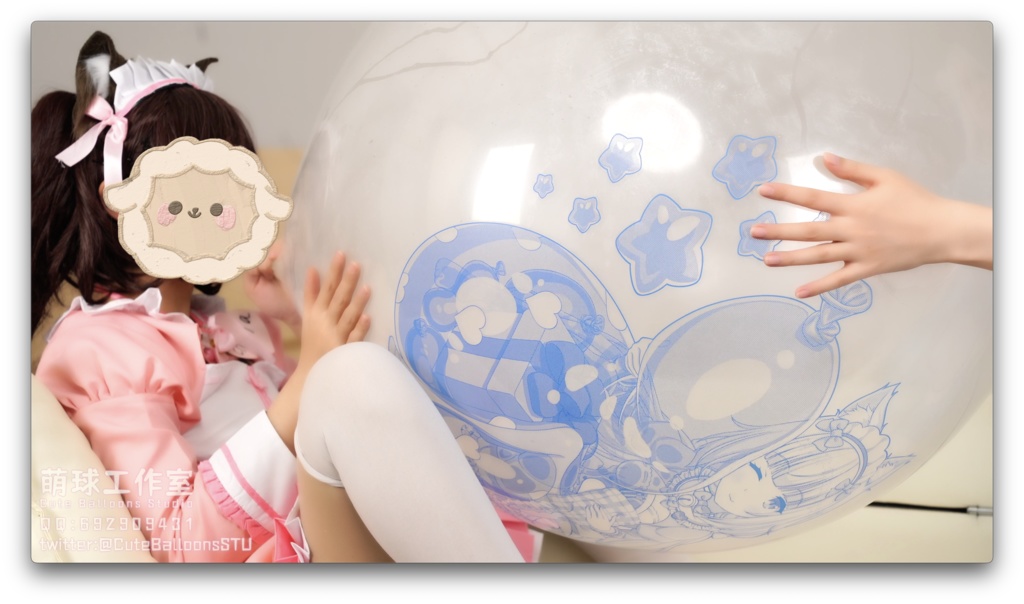 猫娘ペアがT 36風船を口で吹く