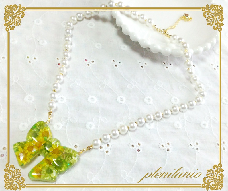 【ジョジョの奇妙な冒険】レジンリボンのネックレス【2部】