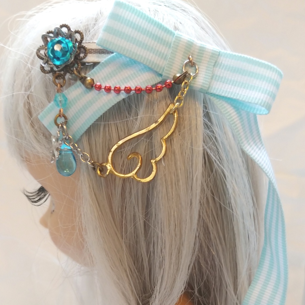水色の花と羽根の水色リボンのヘアアクセサリー Pinkissimo 碧色factory Booth