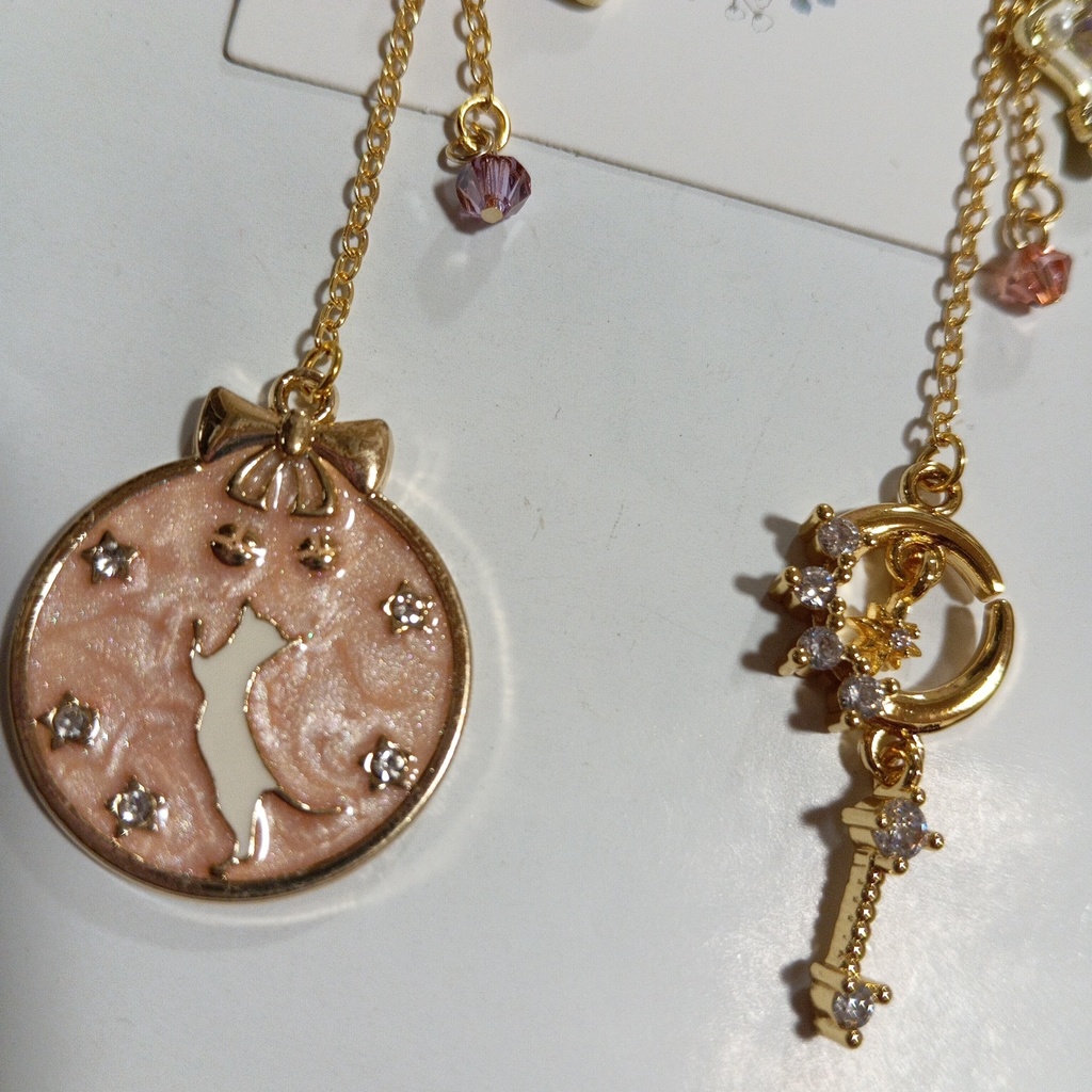 ハンドメイドピアス ゆめかわ猫 パープルピンクゴールド 星月 スワロフスキー 魔法少女 かわいい ガーリー