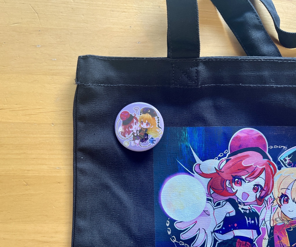 からまっちゃった缶バッジ