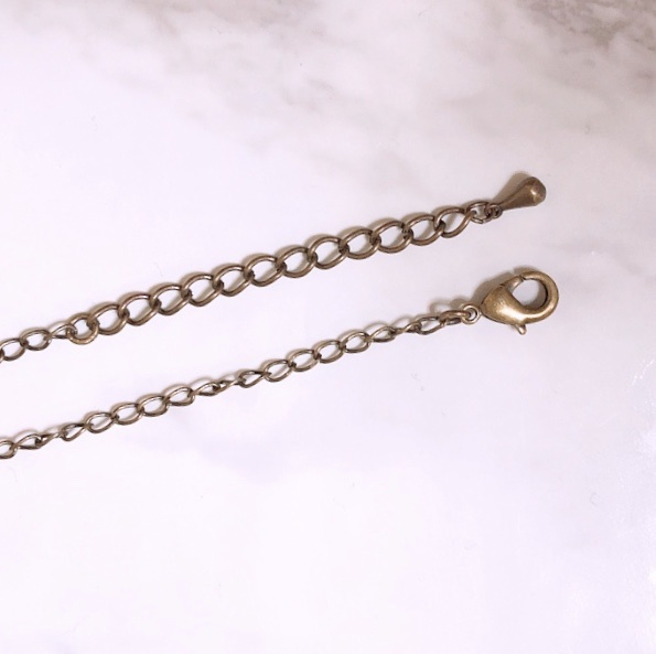 時を刻むネックレス