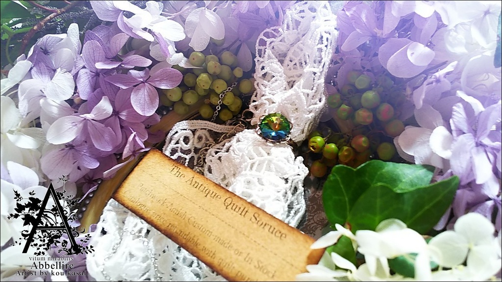 虹色ヴィトラルのリングネックレス