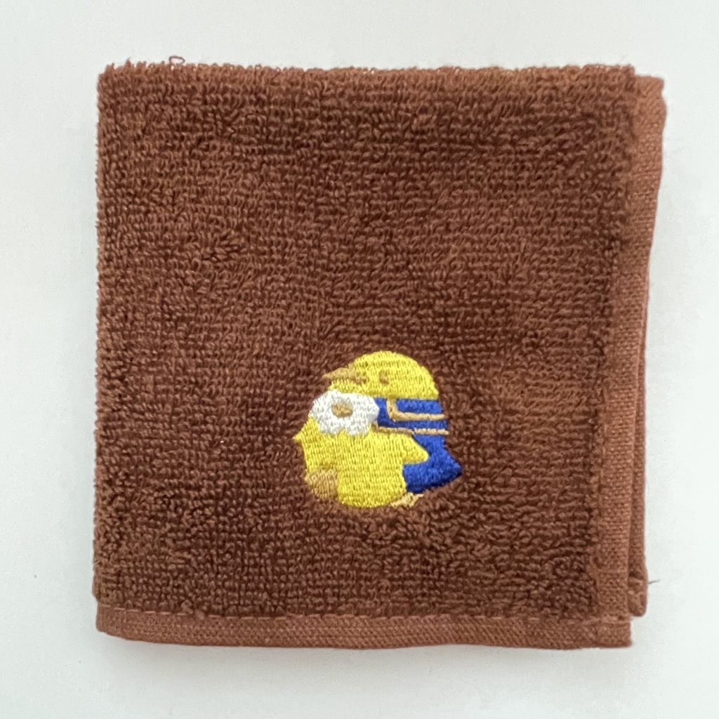 敵の卑劣な攻撃によりキングペンギンの雛の姿になってしまった王様の刺繍タオル
