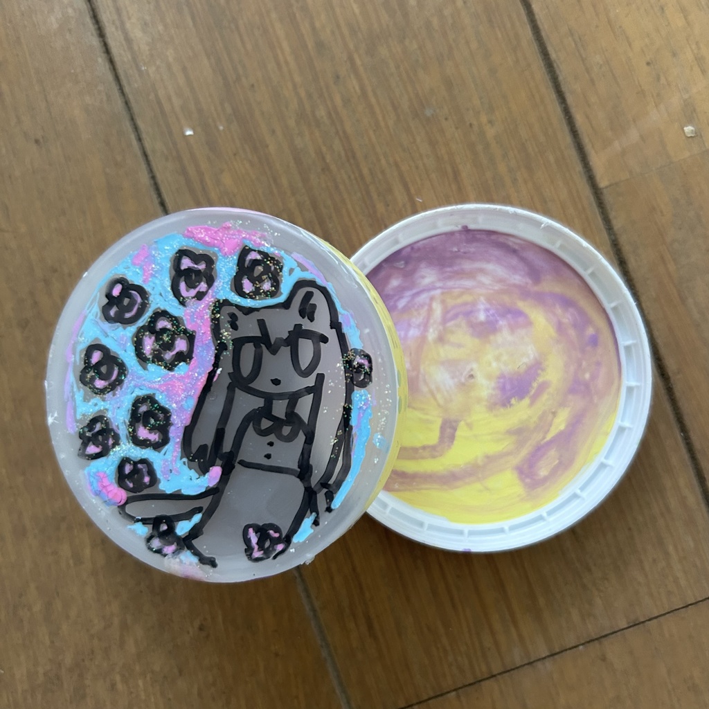 丸いケース　人間猫お花