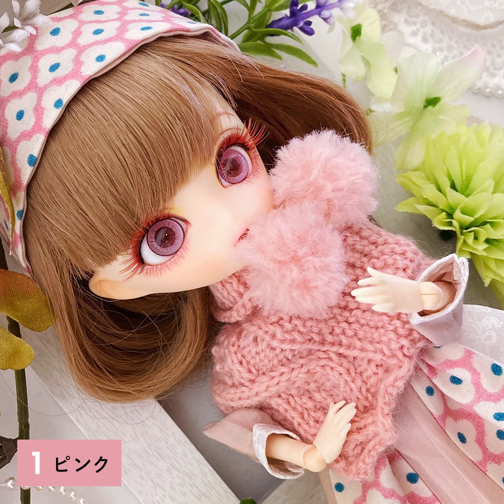 ポンポン付きポンチョ