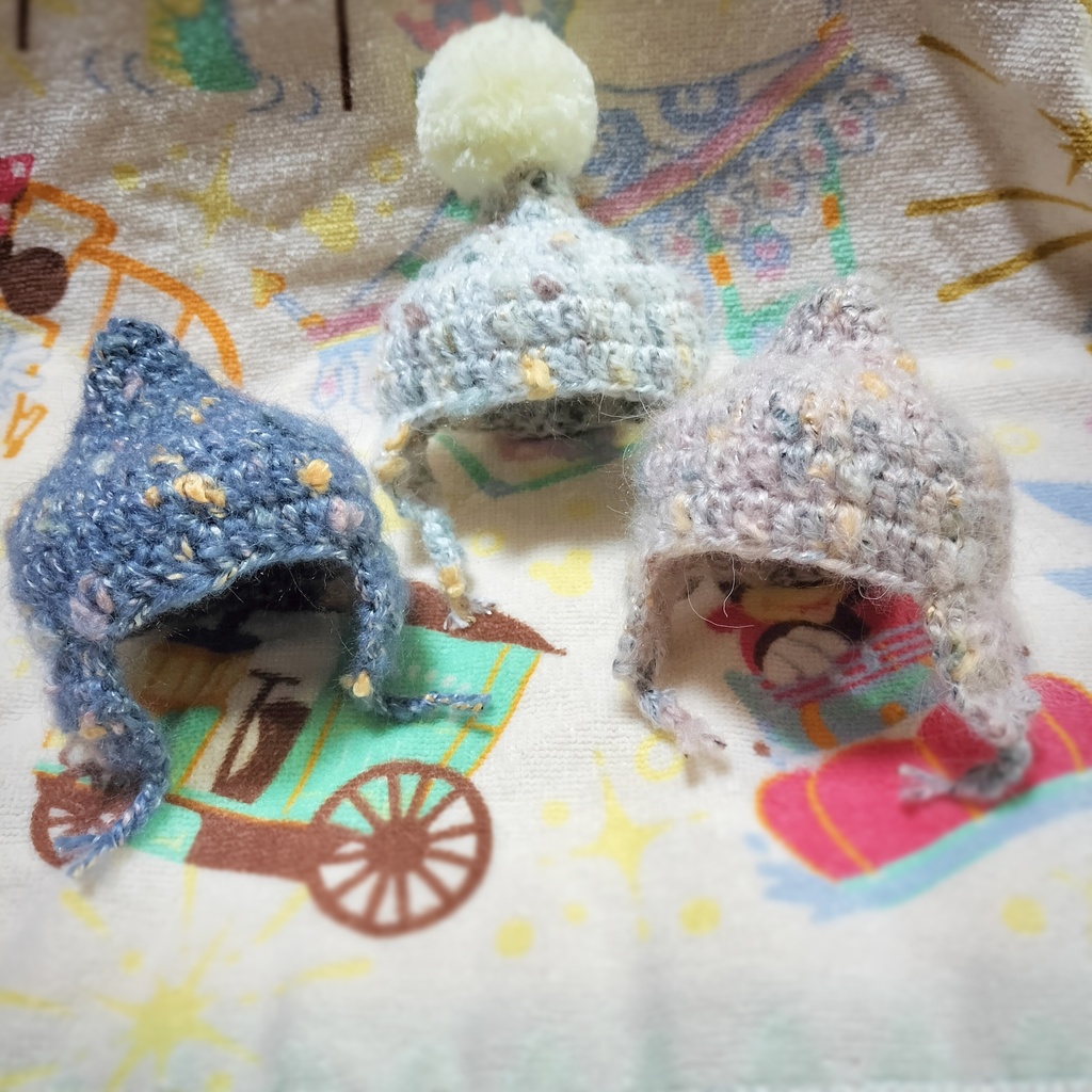 耳あて付雪降るニット帽子