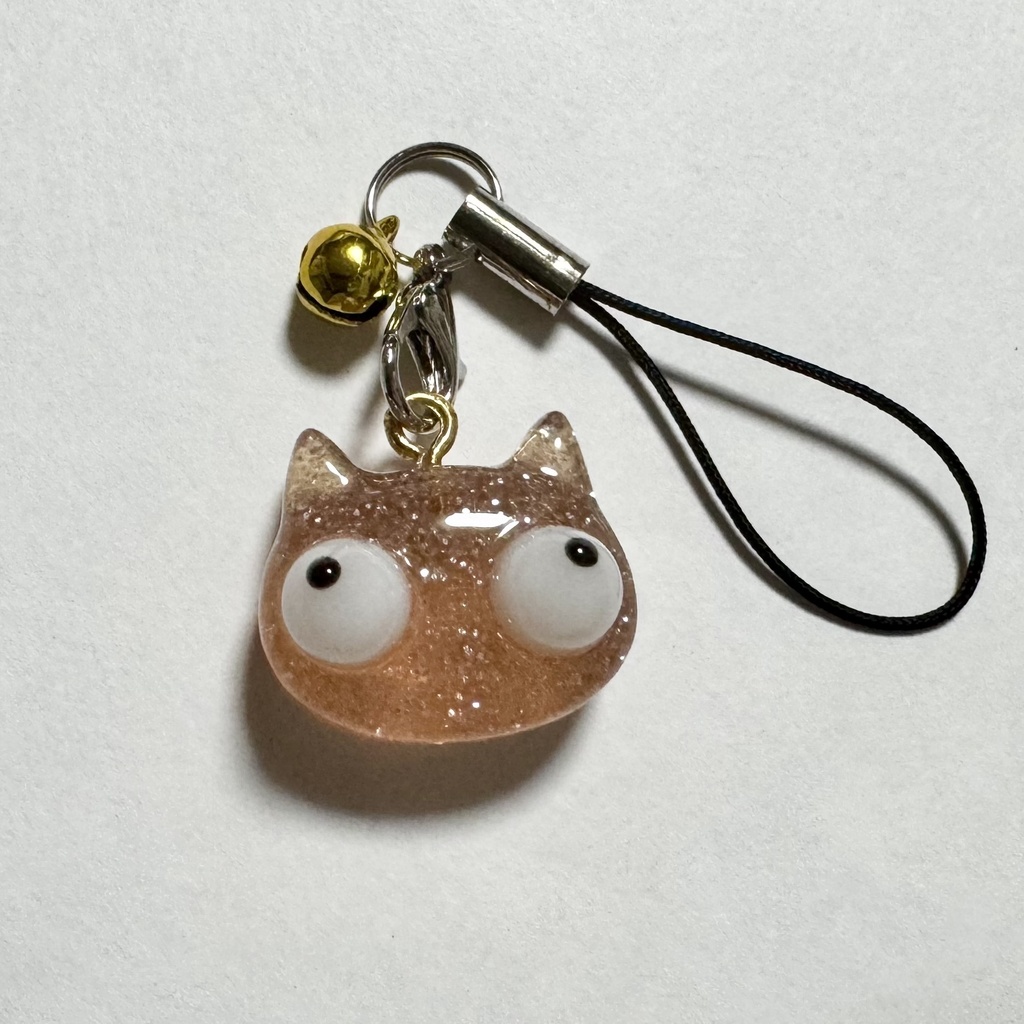 デメにゃんストラップ　トパーズ