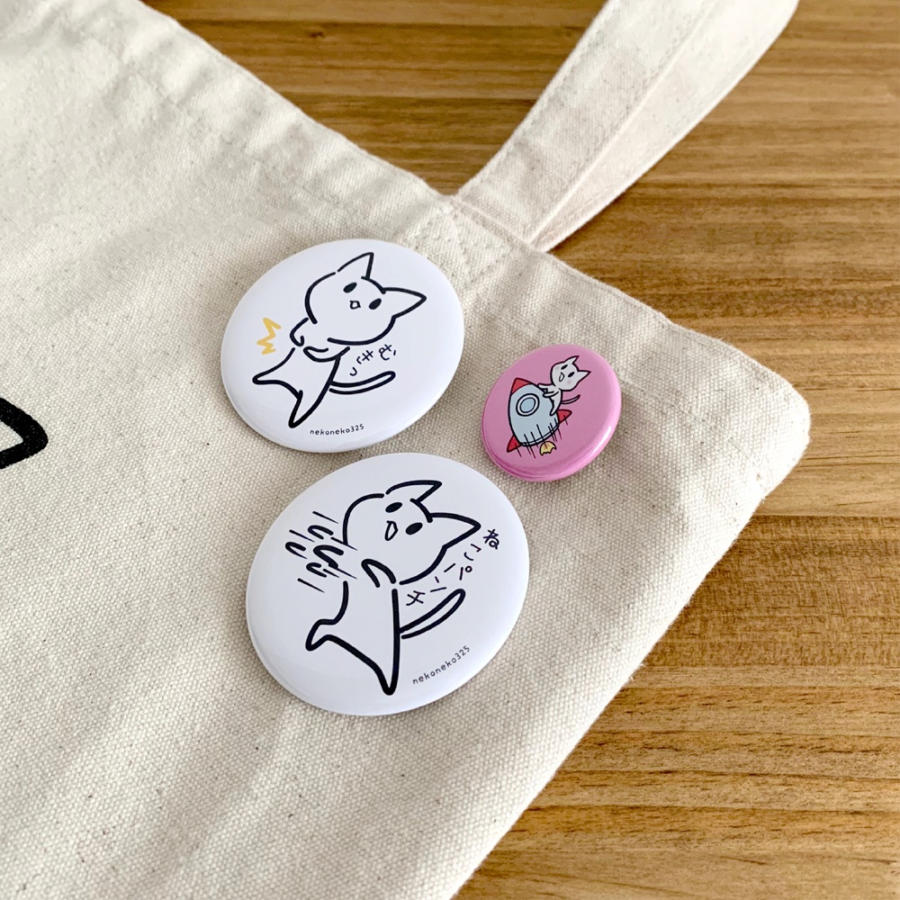 むきむきねこ 缶バッジ