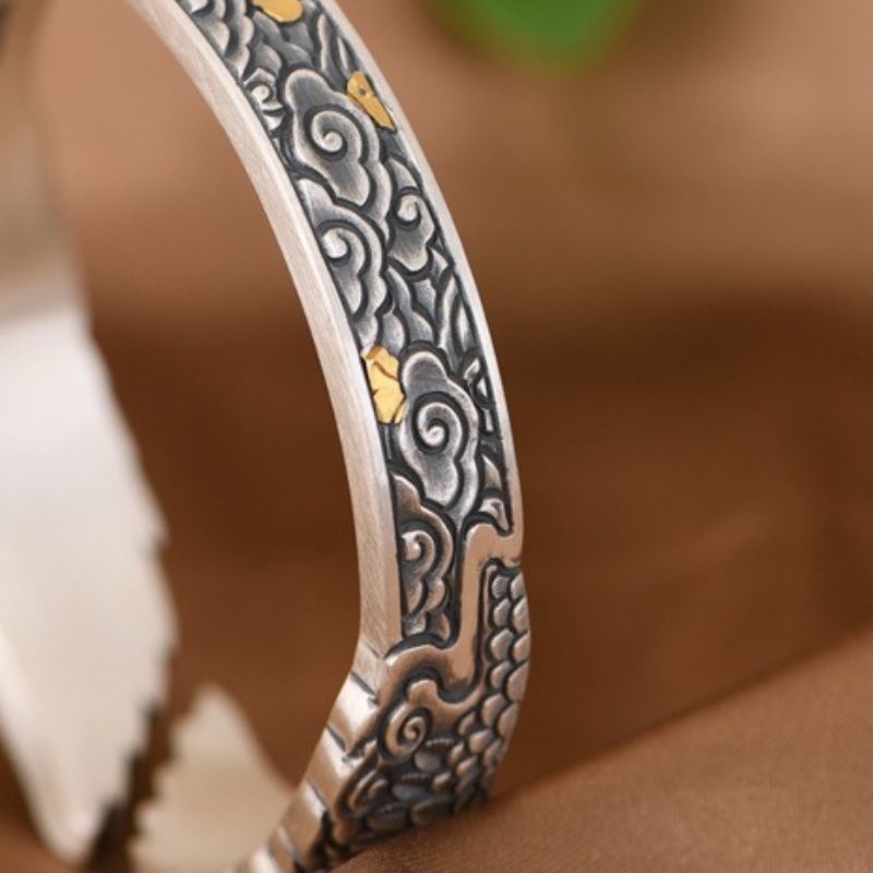 羽モチーフのバングル - 細かな彫刻を施した豪華な純銀アクセサリーB059