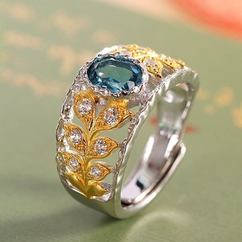 ブルートパーズリング - 自然の優雅さを表現する葉のデザイン R459