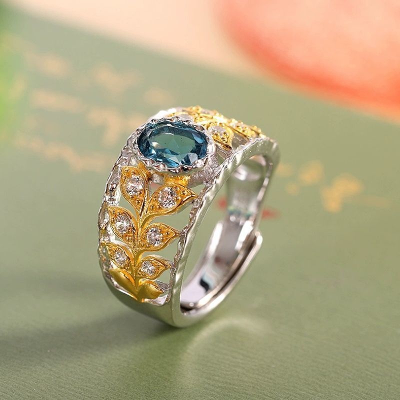 ブルートパーズリング - 自然の優雅さを表現する葉のデザイン R459