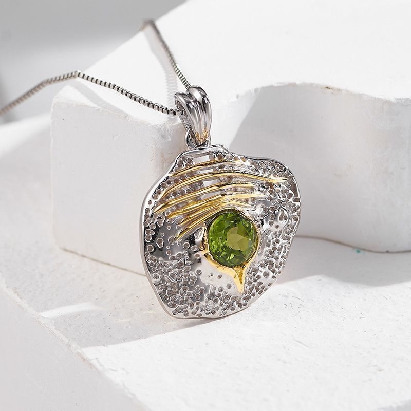 ペリドットのペンダント - ユニークなラインとテクスチャーが特徴 N154