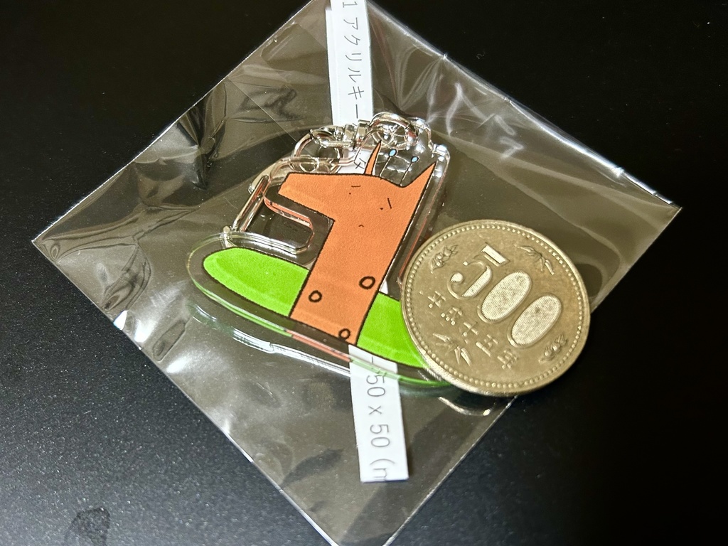 穴に落ちたキリンさんアクリルキーホルダー