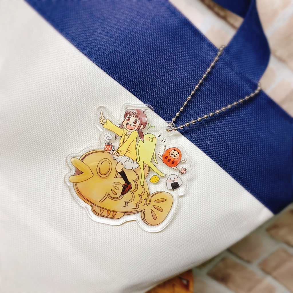 『たい焼きに乗って…』アクリルキーホルダー