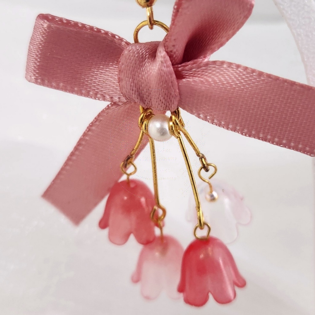リボンと花の揺れるピアス|ピンクフラワー×パール