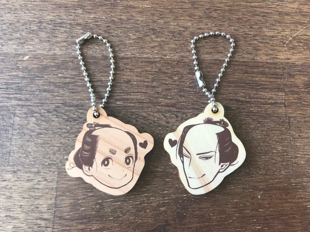 紗久楽さわ『百と卍』木製キーホルダー2種セット