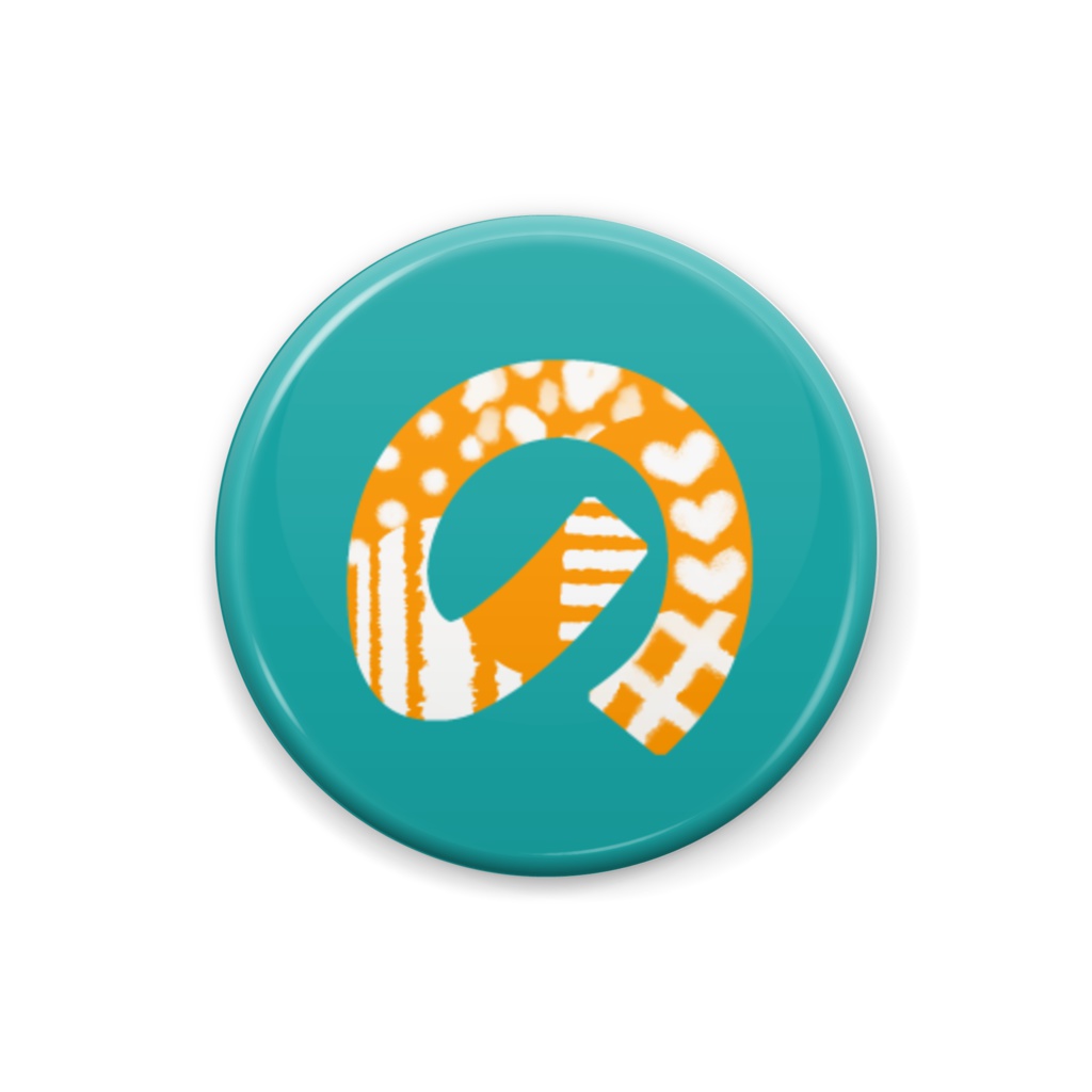 柄文字缶バッジ 「の」 (オレンジ×緑)