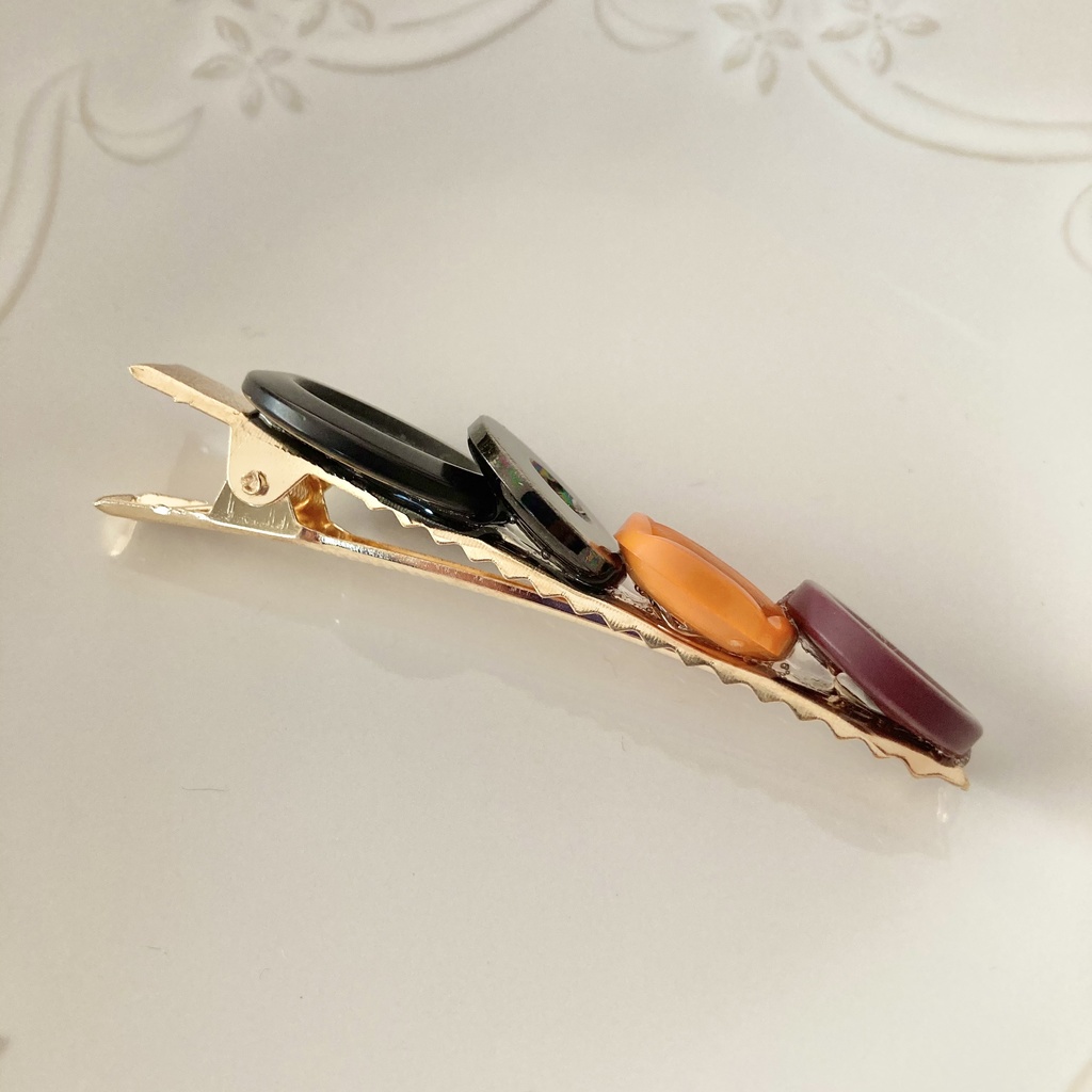 送料込み⭐︎オレンジ×紫のボタンヘアクリップ