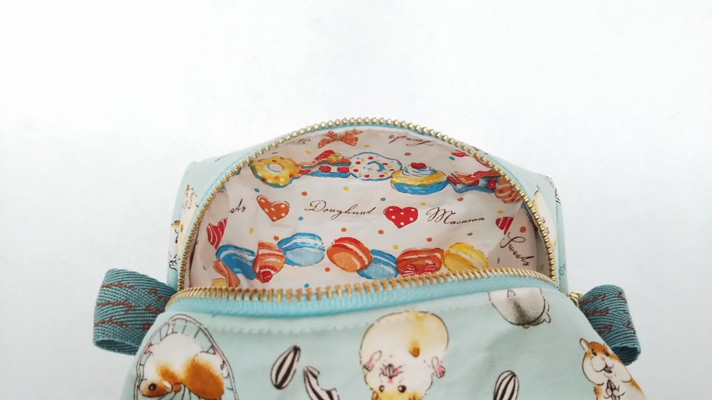 コロコロ🎵ハムスターのキャラメルポーチ